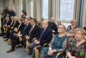Zdjęcie przedstawia gości będących uczestnikami spotkania noworocznego Środowiska Sybirackiego Warmii i Mazur.